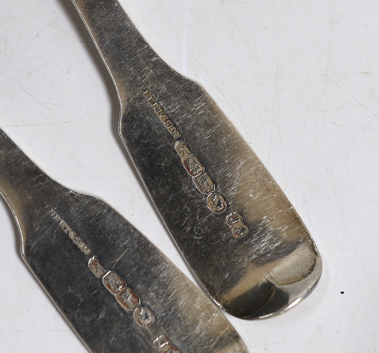A set of six Victorian Irish silver fiddle pattern dessert spoons, maker, JS, Dublin, 1855